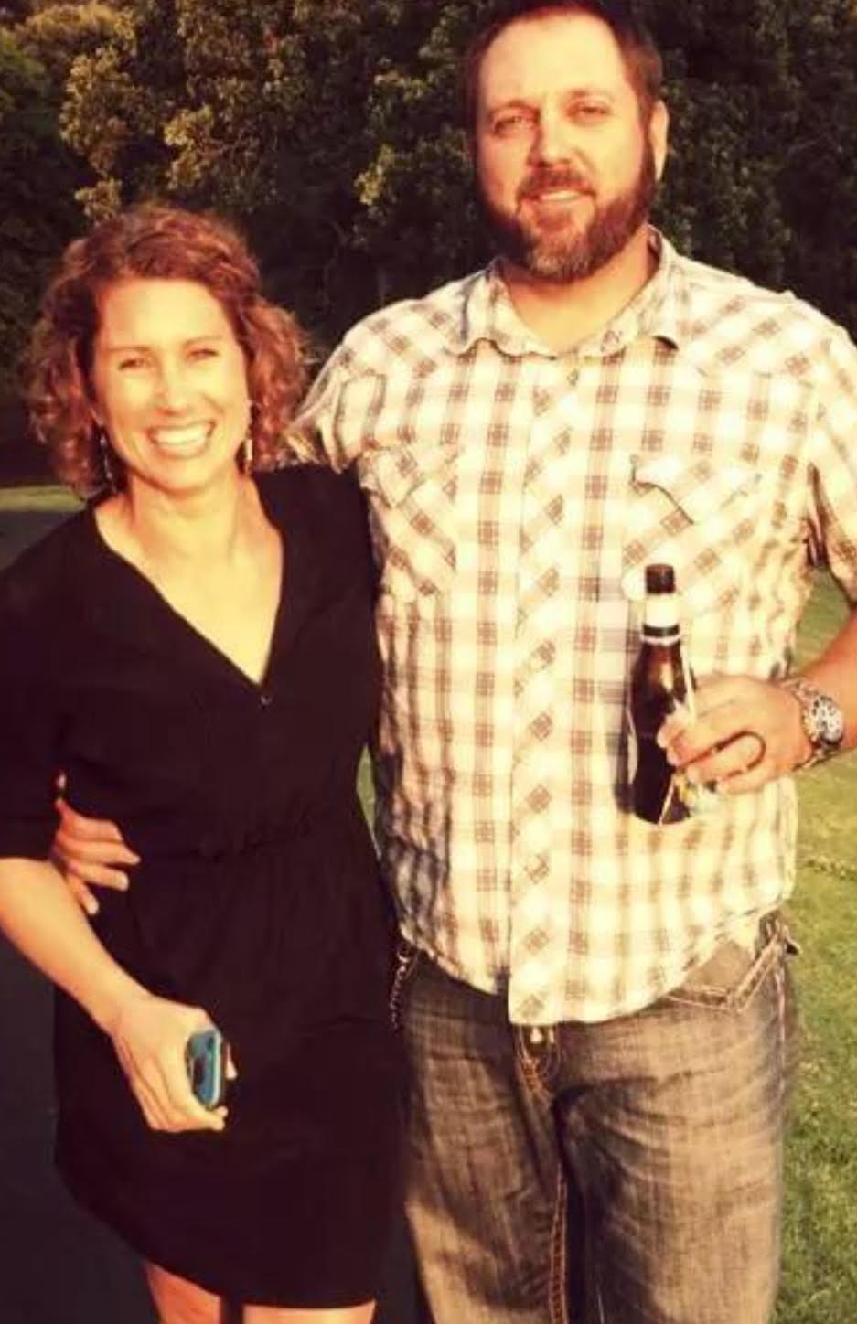 picture of Joanna and Mike with their arms around each other smiling